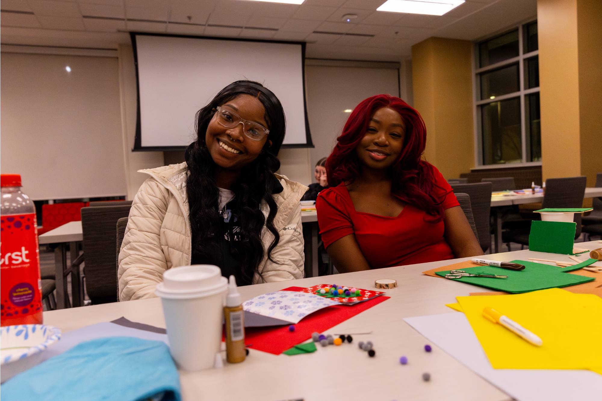 Two girls posing at a Winterfest event